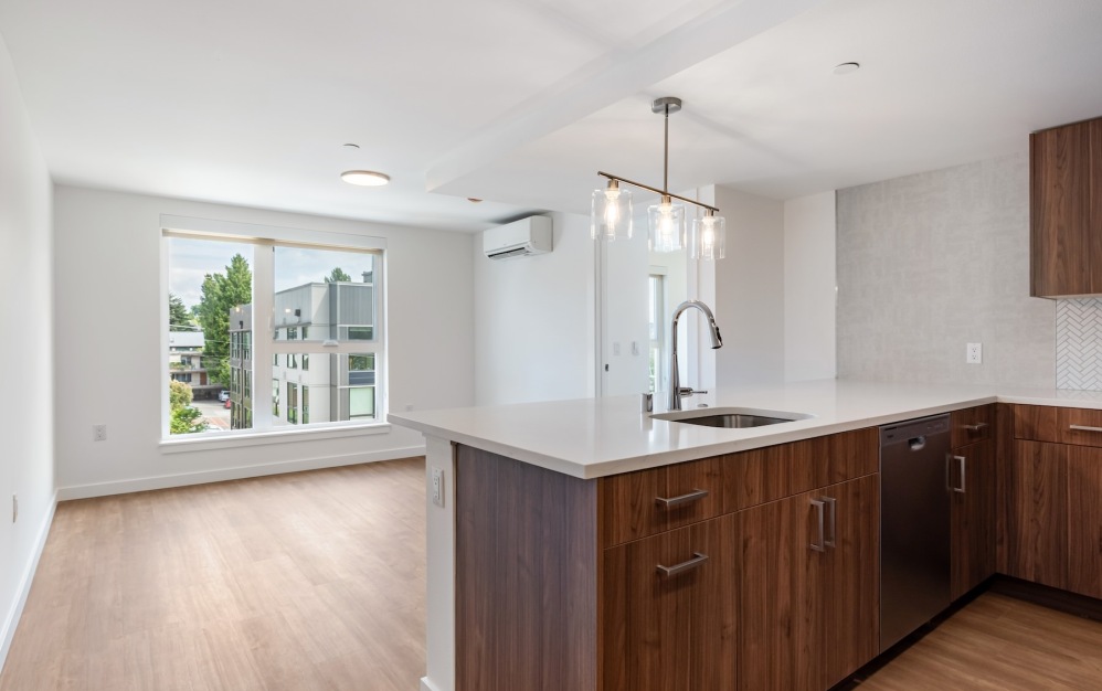 a kitchen with wood cabinets