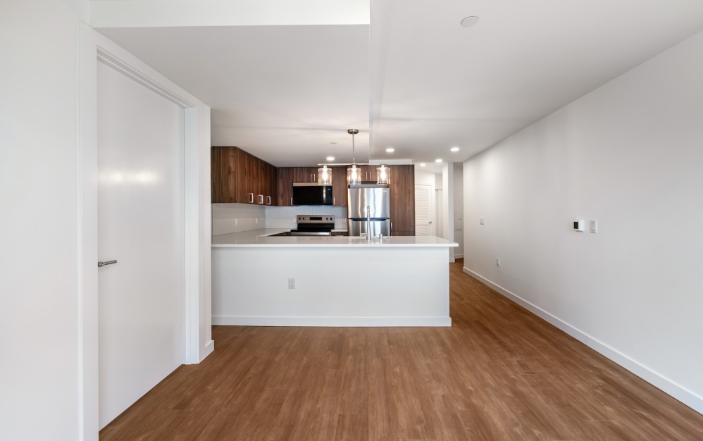 a kitchen with wood floors