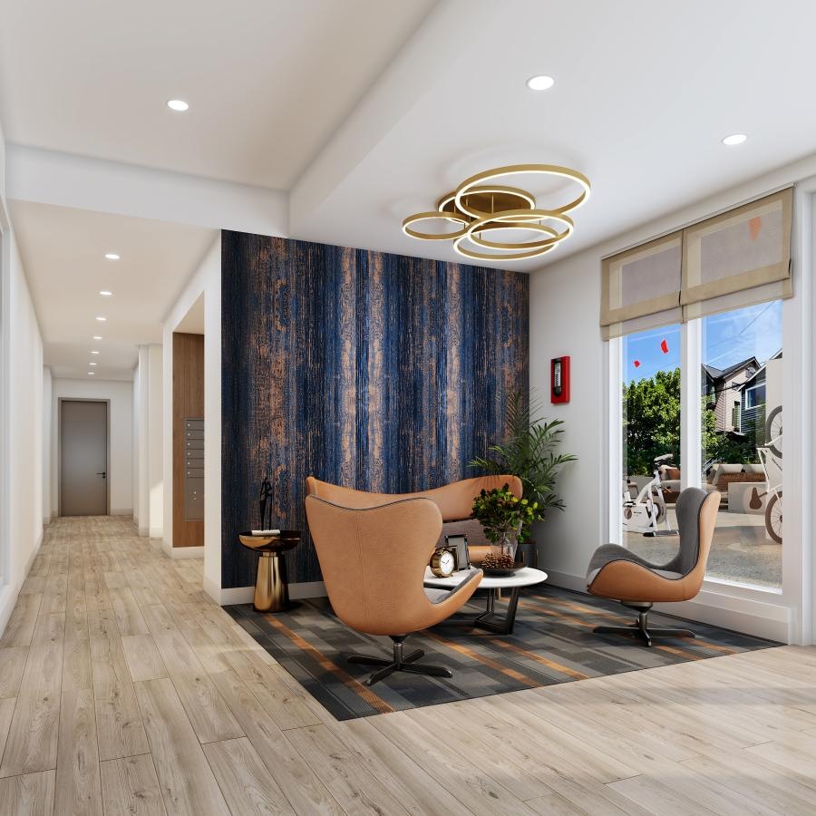 a lounge with seating wood flooring and windows