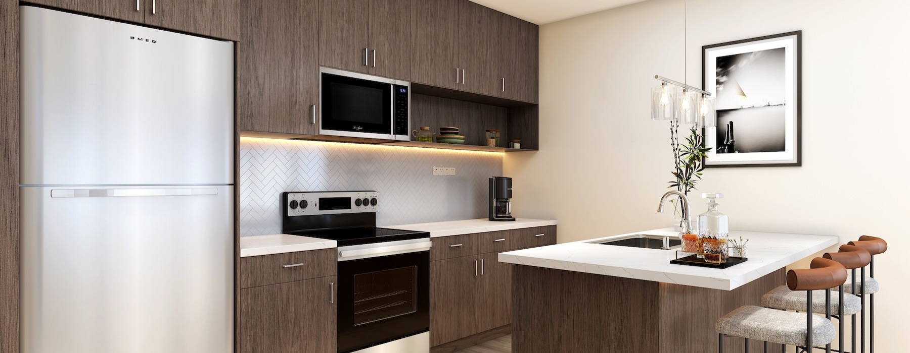 a kitchen with a bar stool in a well-lit kitchen with ample counter space