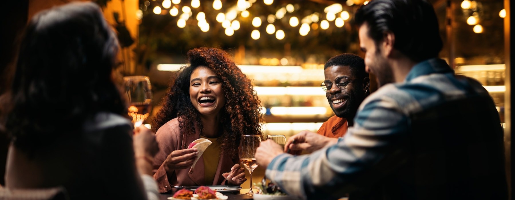 a group of people sitting at a table